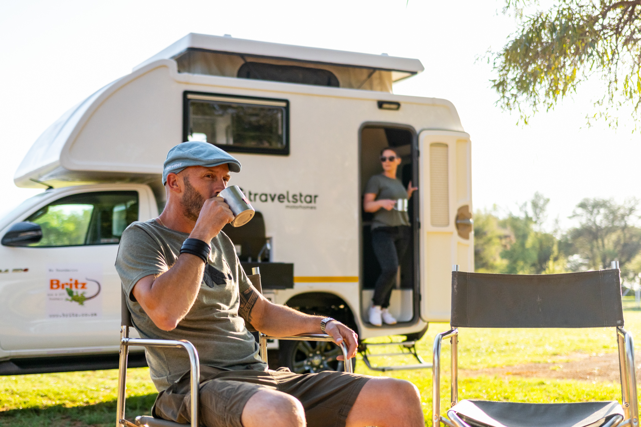 Toyota Navi Camper — couple relaxing at a bush camp