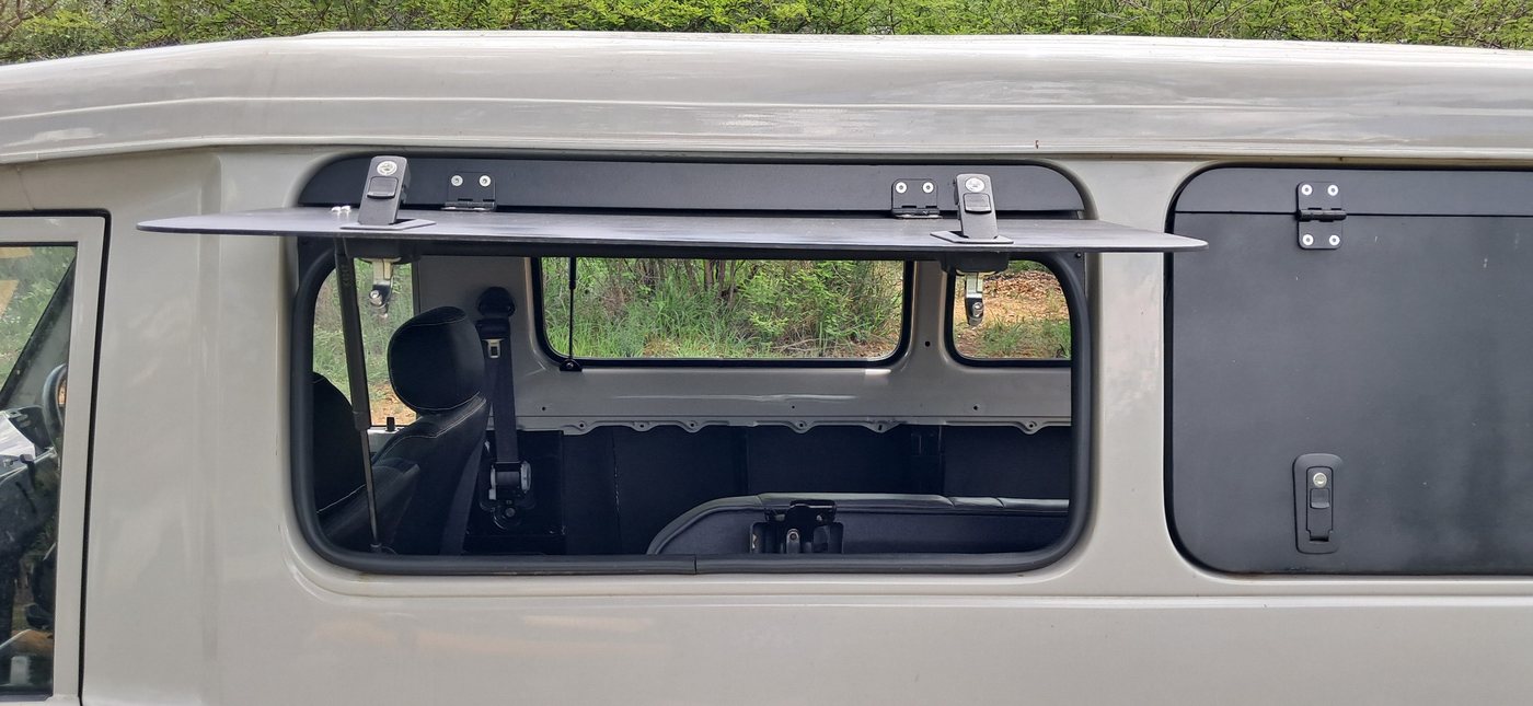 Gullwing conversion open — side profile on Toyota Troopy
